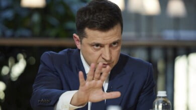 Ukrainian President Volodymyr Zelensky gestures while speaking to the media during a news conference in Kyiv Ukraine on Friday November 26 2021. Ukrainian Presidential Press Office via AP
